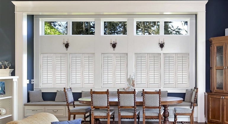 Cleveland dining room with shut plantation shutters.